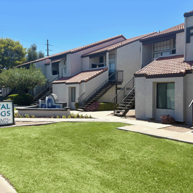 Community entrance and apartment buildings.