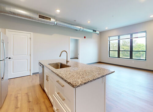 Kitchen Island in loft apartment at Lofts at 128 located in downtown Hastings, MI