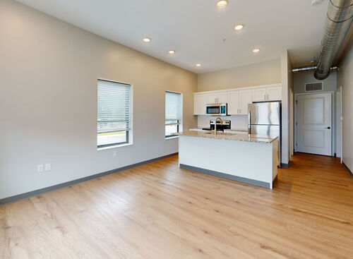 Kitchen in 2 bed walk up loft at Lofts at 128 in downtown hastings, mi