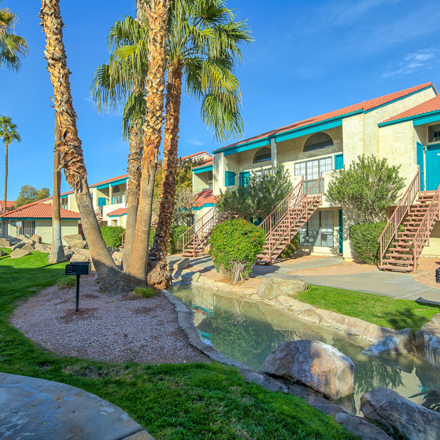 Landscaped grounds and apartment balconies.