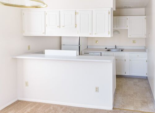 Two Bedroom Deluxe: Beds - 2: Baths - 1.5: SqFt Range - 1015 to 1075