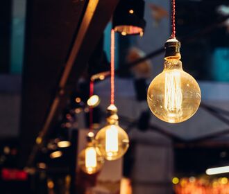 Stock photo of decorative lights hanging from a ceiling.