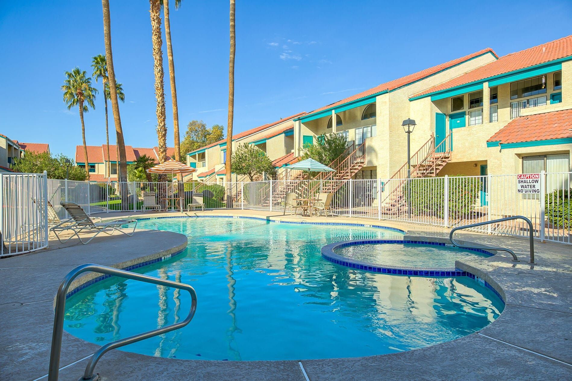 Community swimming pool and hot tub.