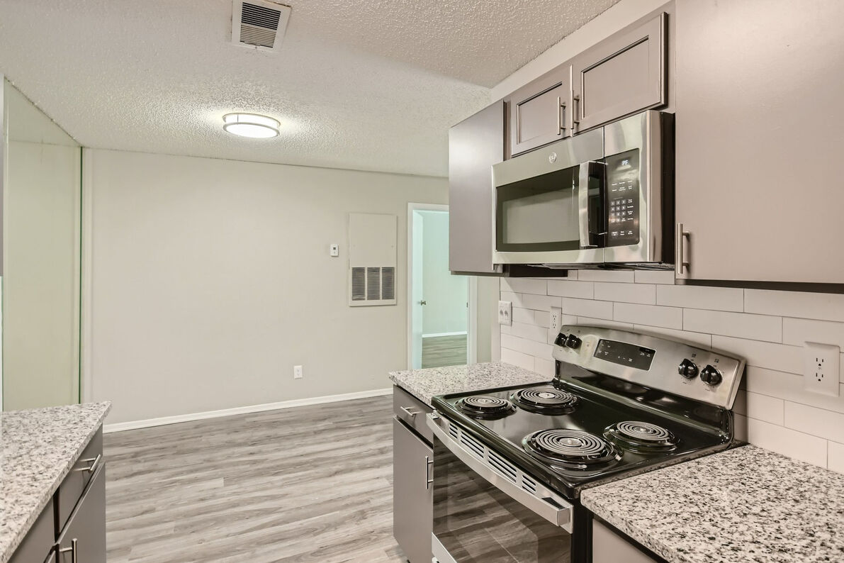 Villas at Waterchase Apartments kitchen and dining area - Lewisville, TX