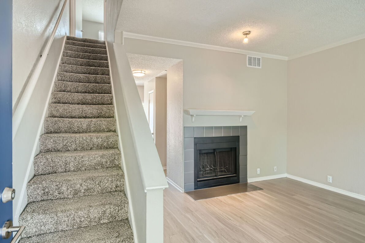 The Tallows Apartments renovated living room - Carrollton, TX
