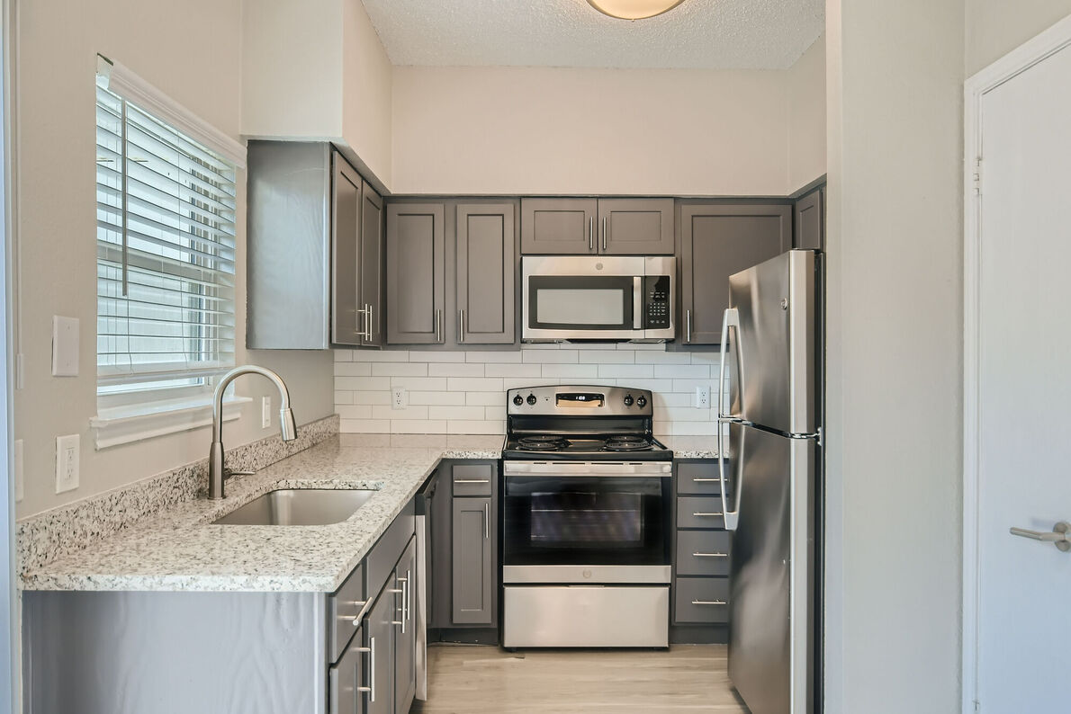 The Tallows Apartments renovated kitchen - Carrollton, TX