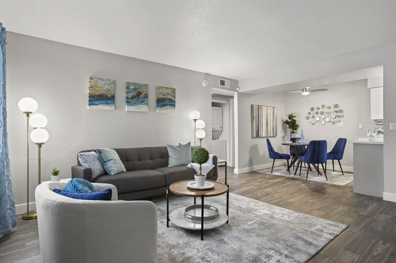 living room with taupe sofa set and coffee table at park at palm valley