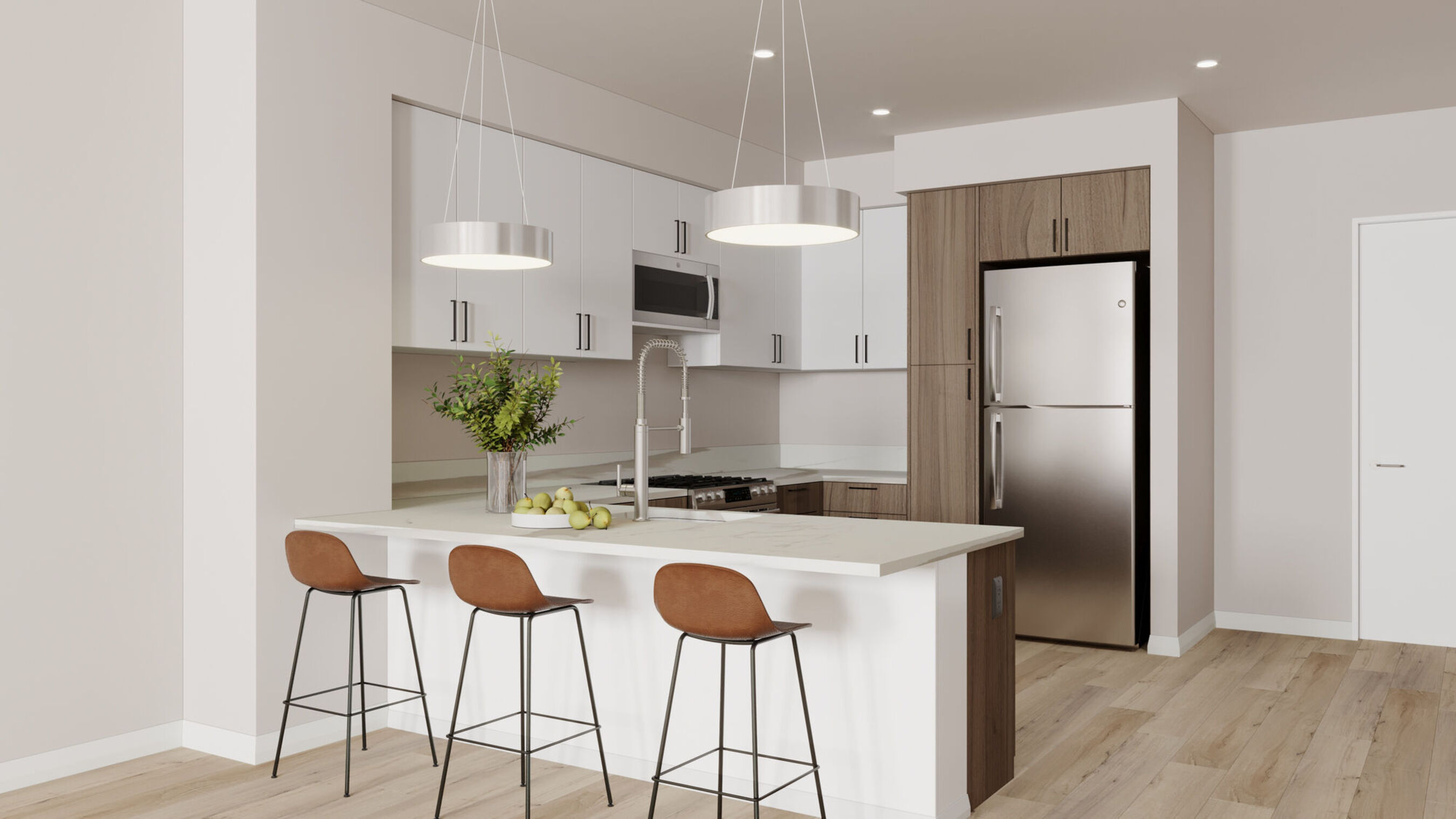 Virtually rendered image of kitchen interior with stainless steel appliances and two-toned cabinets with quartz countertops