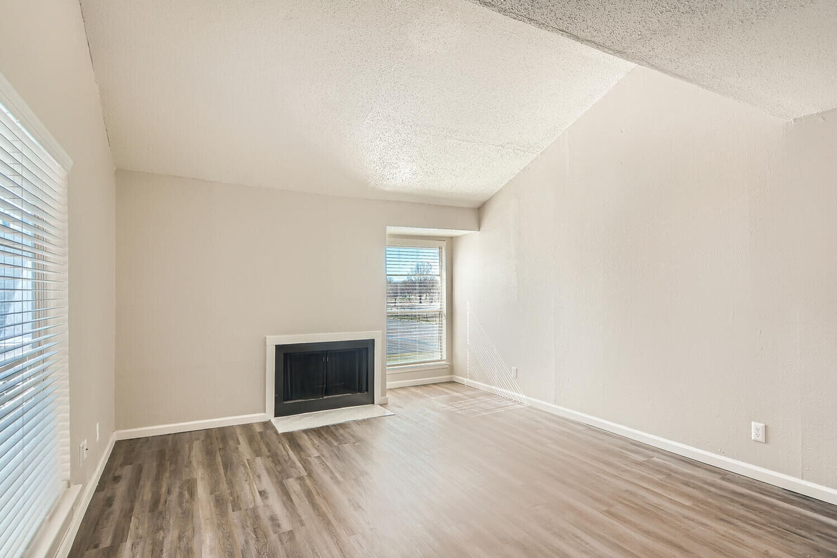 The Leighton Apartments renovated fireplace view - Plano, TX