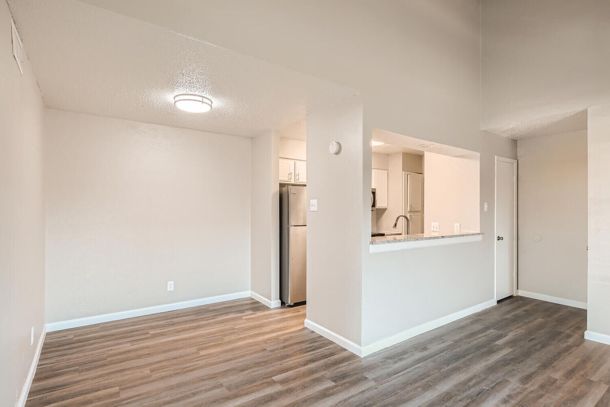 The Leighton Apartments renovated dining to kitchen view - Plano, TX