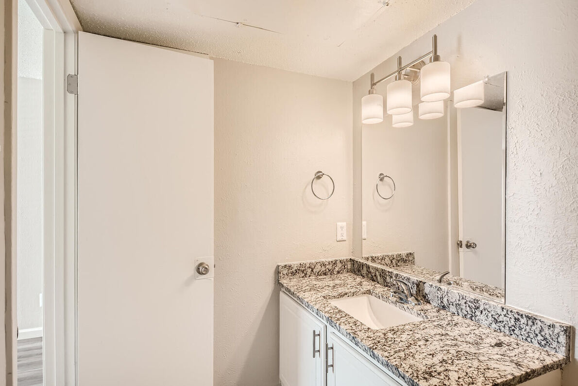 The Leighton Apartments renovated vanity - Plano, TX