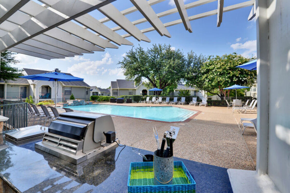 Fieldcrest Apartments poolside grill area - Carrollton, TX