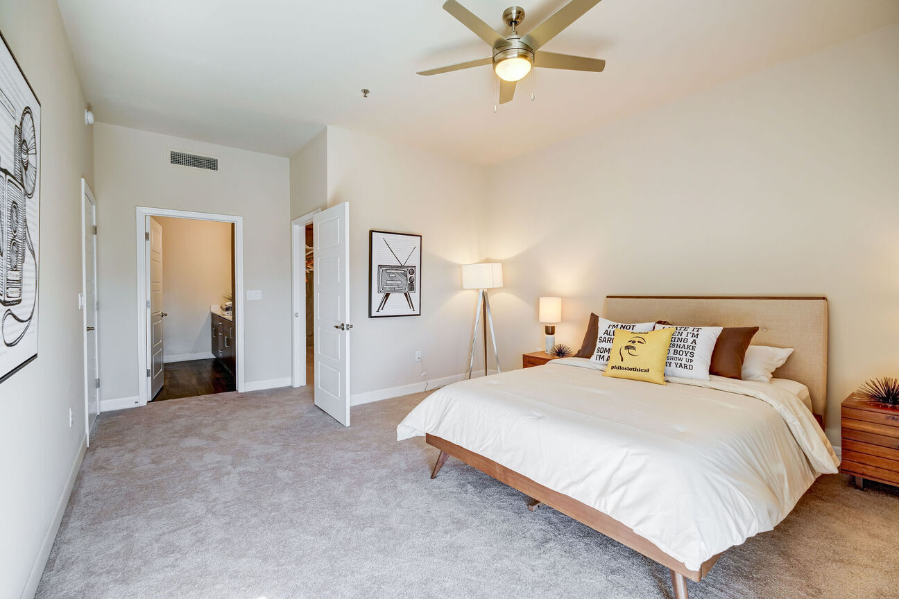 Furnished bedroom shown at The Stewart.