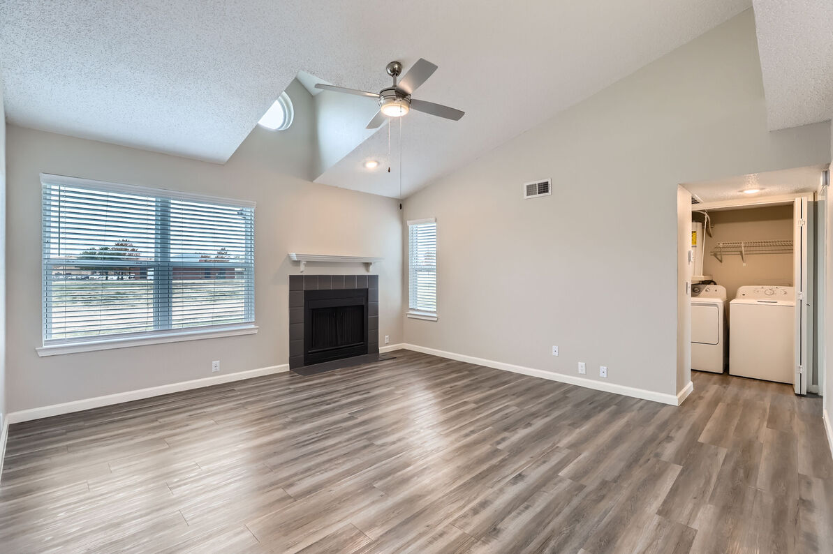 The Tallows Apartments living room - Carrollton, TX