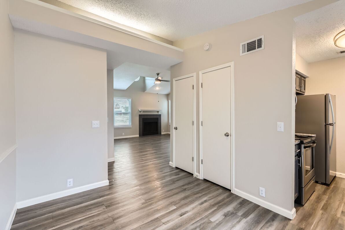 The Tallows Apartments dining to living area - Carrollton, TX