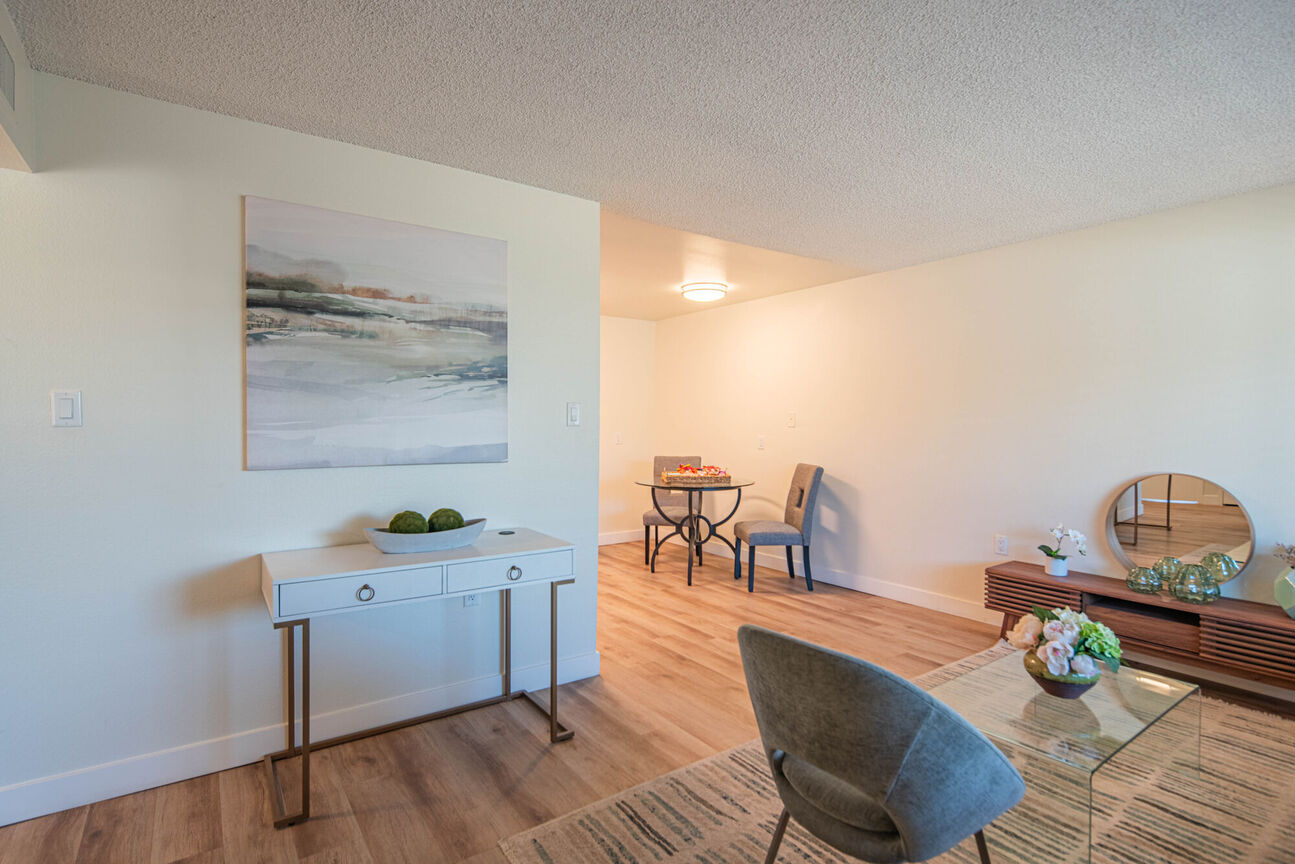 Furnished apartment living area shown at Phoenix Manor.