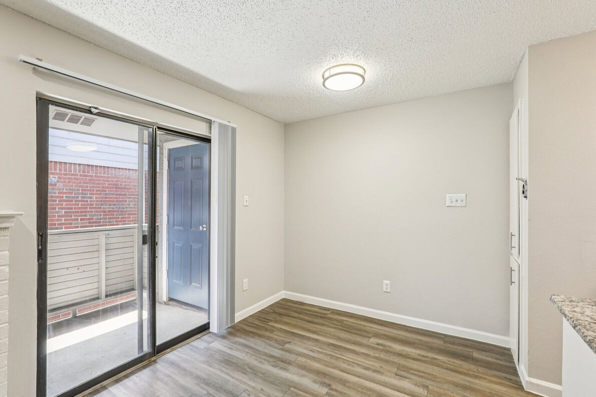 Claro Court Apartments dining area and kitchen - Dallas, TX