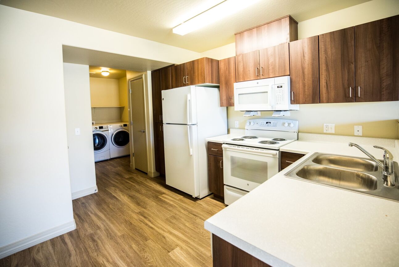 Apartment kitchen at Coffelt-Lamoreaux.