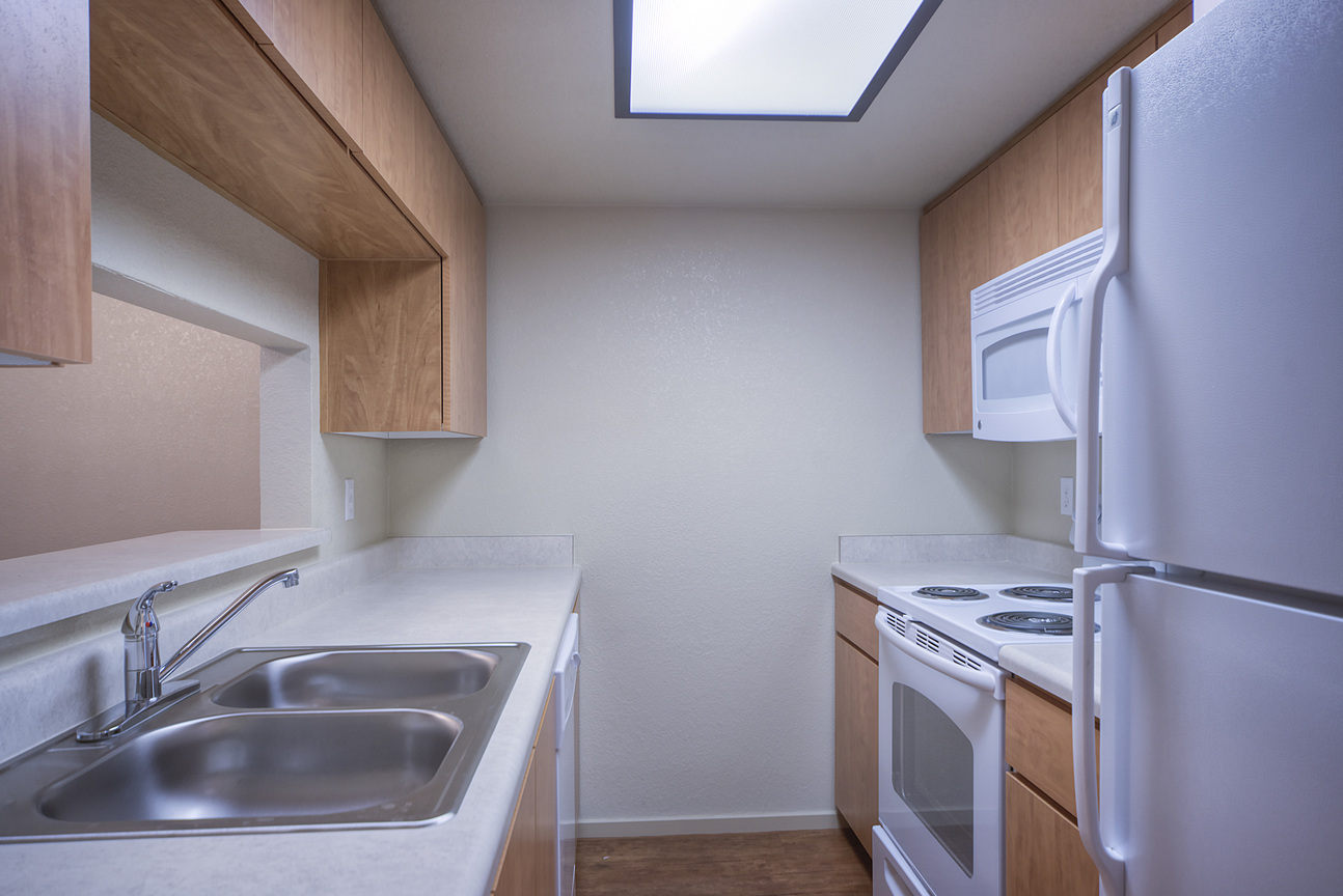 Apartment kitchen — representative home at West Eleventh.
