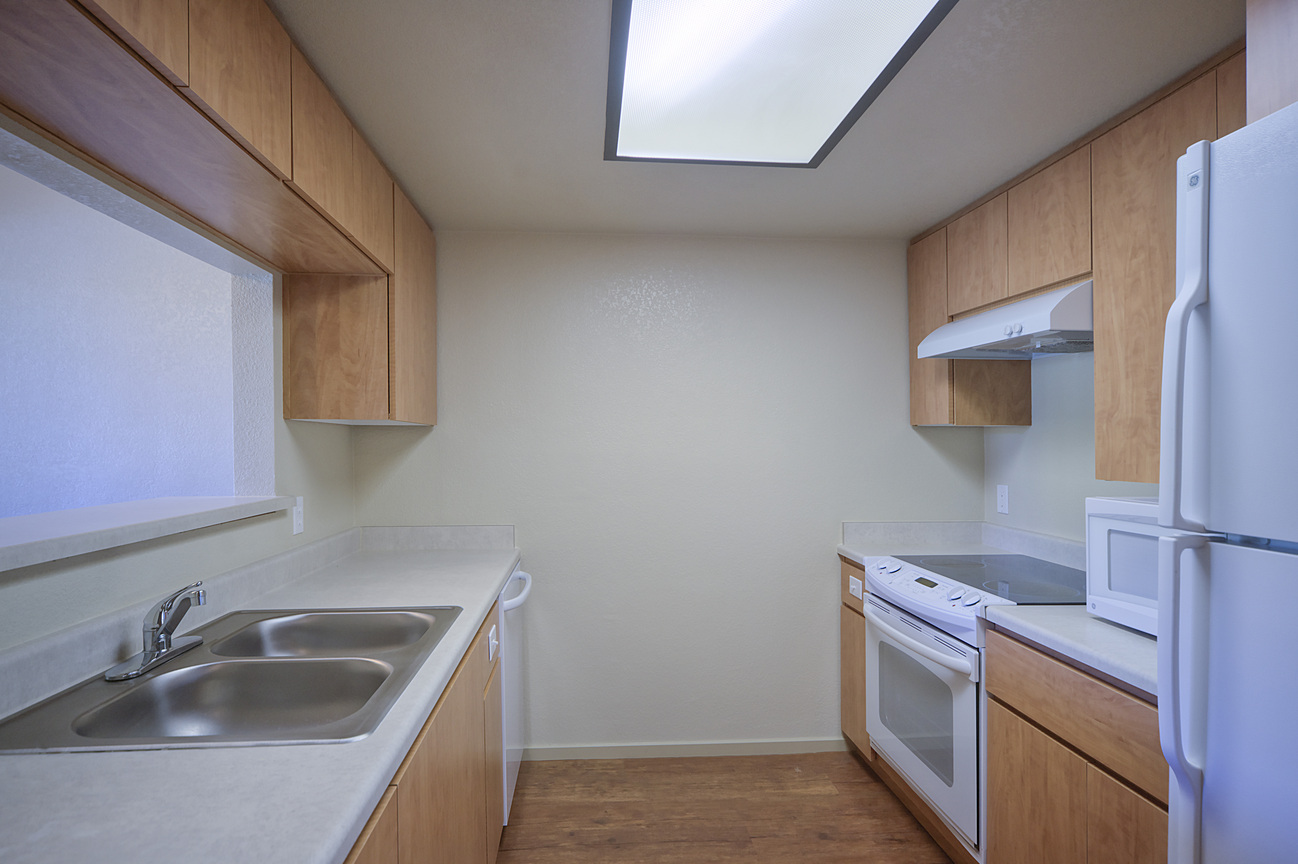Apartment kitchen — representative home at West Eleventh.